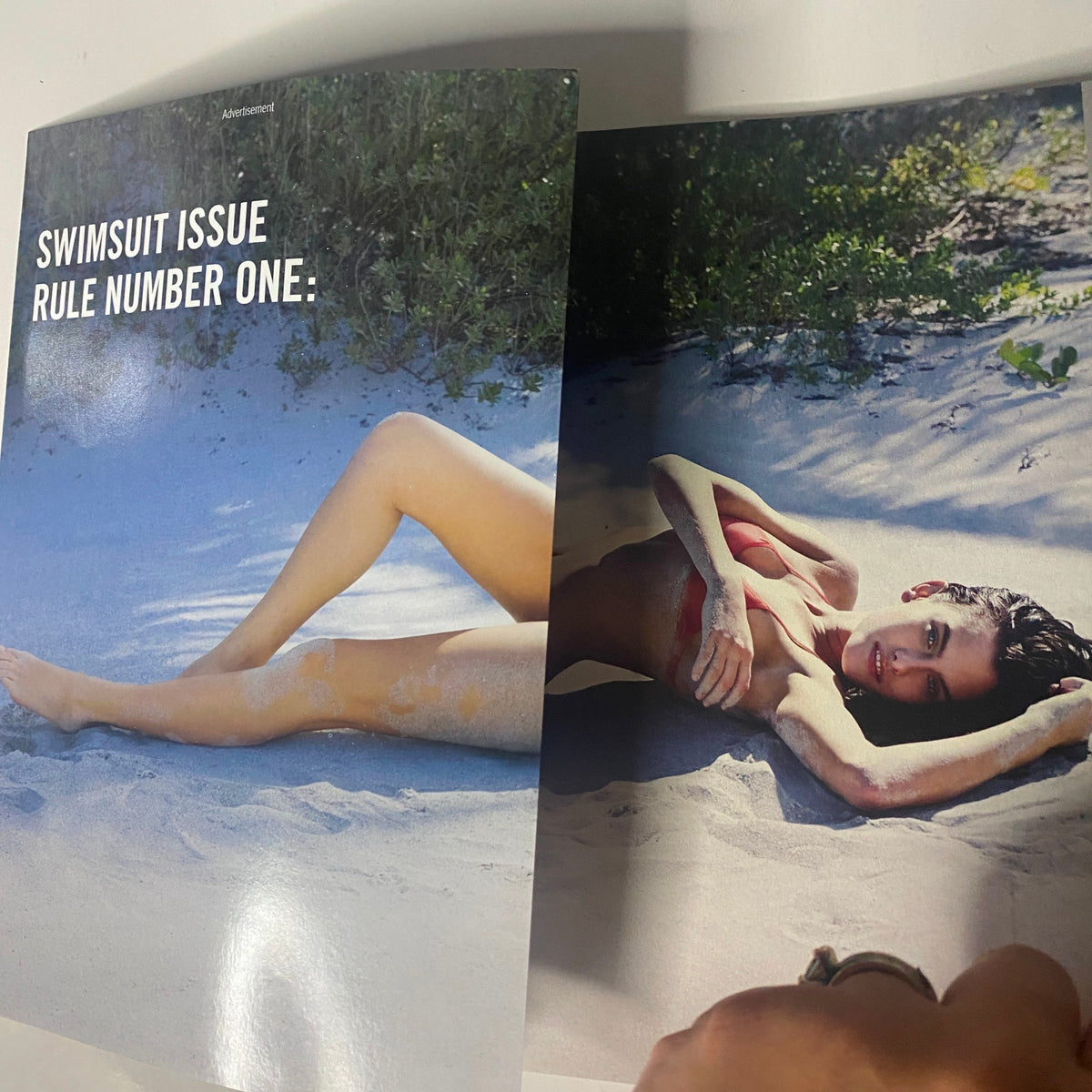 Inside spread of the Sports Illustrated Magazine February 13, 2009 Swimsuit Edition, featuring a model on a sandy beach, emphasizing the magazine's focus on swimwear and beach culture.