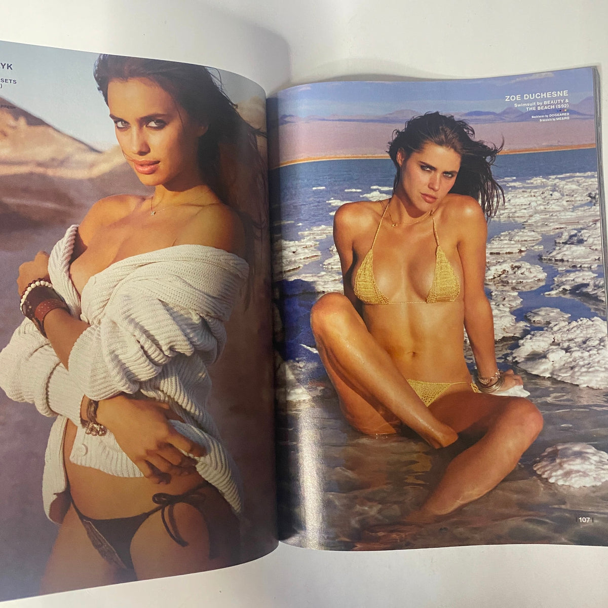 Double-page spread from Sports Illustrated Winter 2010, featuring Irina Shayk and Zoe Duchesne in stunning beachwear. Highlighting the glamour and beauty of the Swimsuit Edition.