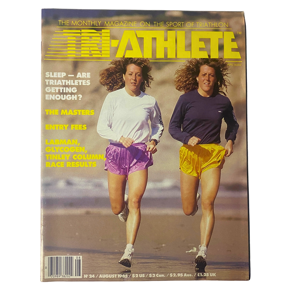TriAthlete Magazine August 1985 No. 24 cover featuring two women running, emphasizing triathlon sports with headlines about athlete lifestyle, entry fees, and nutrition tips.