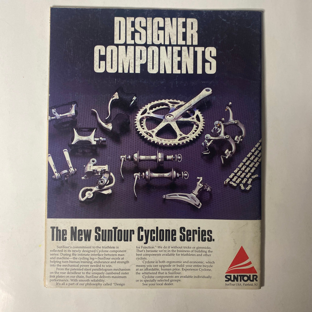 Back cover of Triathlon Magazine September 1985 Vol 3 No. 6, featuring an advertisement for Designer Components and the new SunTour Cyclone Series.