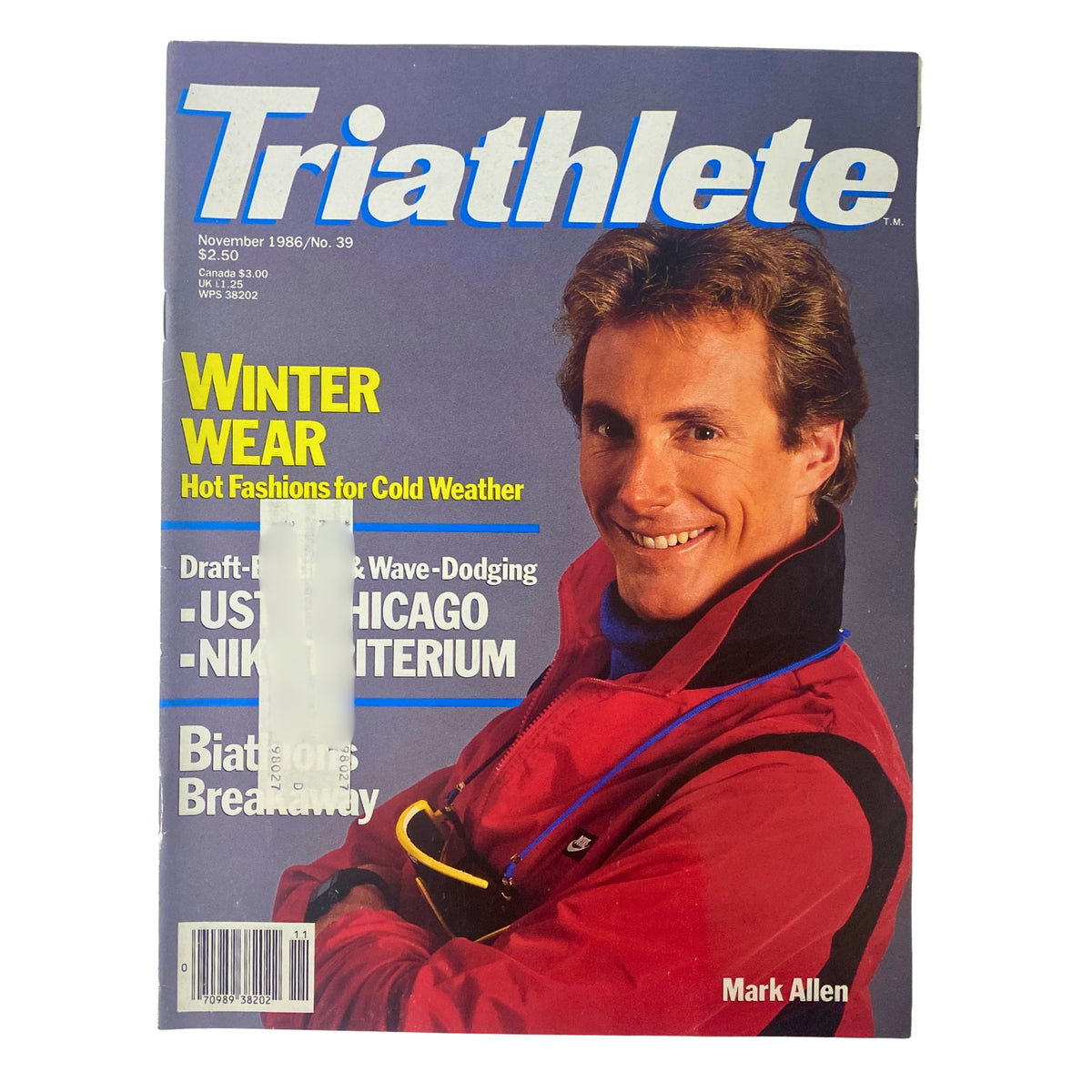 Triathlete Magazine November 1986 No. 39 featuring Mark Allen on the cover, showcasing winter sportswear. Highlighting topics like cold weather fashion and biathlon.