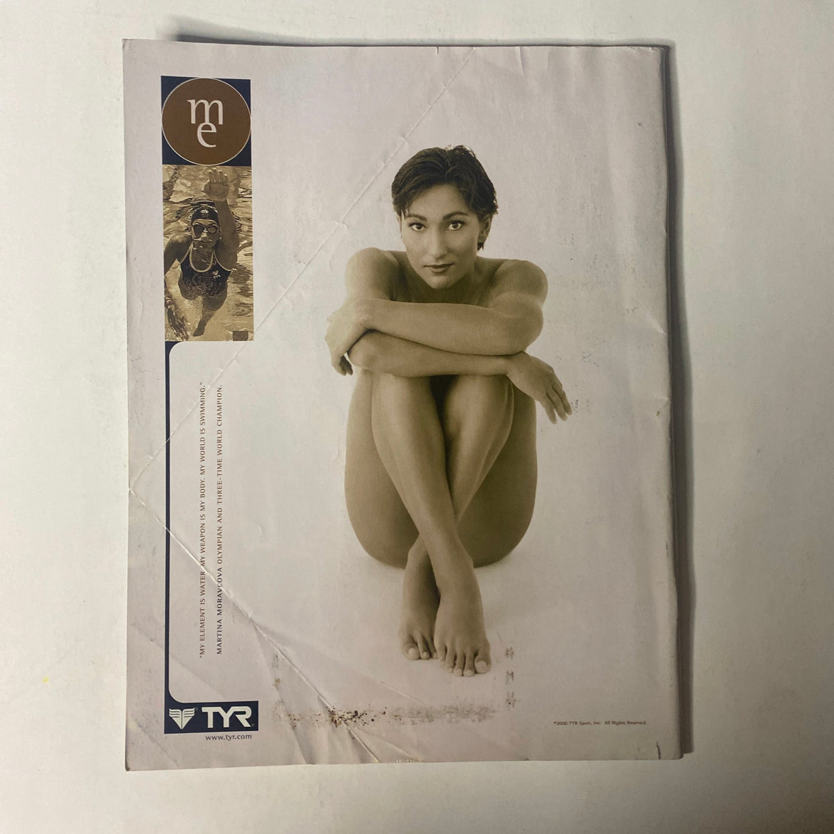 Back cover of Triathlete Magazine September 2000 featuring a promotional image with a model, emphasizing athleticism and endurance sports.