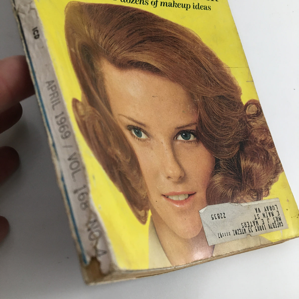 Side view of the Good Housekeeping Magazine April 1969, showcasing the iconic Cheryl Tiegs on the cover, reflecting vintage hairstyle trends of the late 1960s.