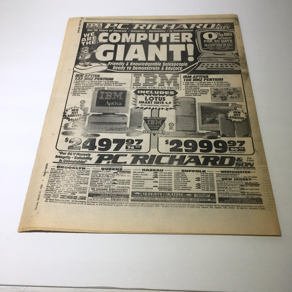 Front page of a vintage computer advertisement from PC Richard, featuring the title 'NY Daily News: March 31 1996 Baseball 1996 Arms Race'.