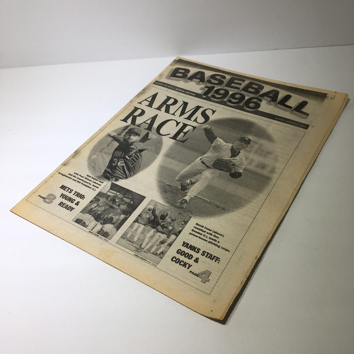 Cover of the NY Daily News newspaper displaying the title 'NY Daily News: March 31 1996 Baseball 1996 Arms Race' with baseball imagery.