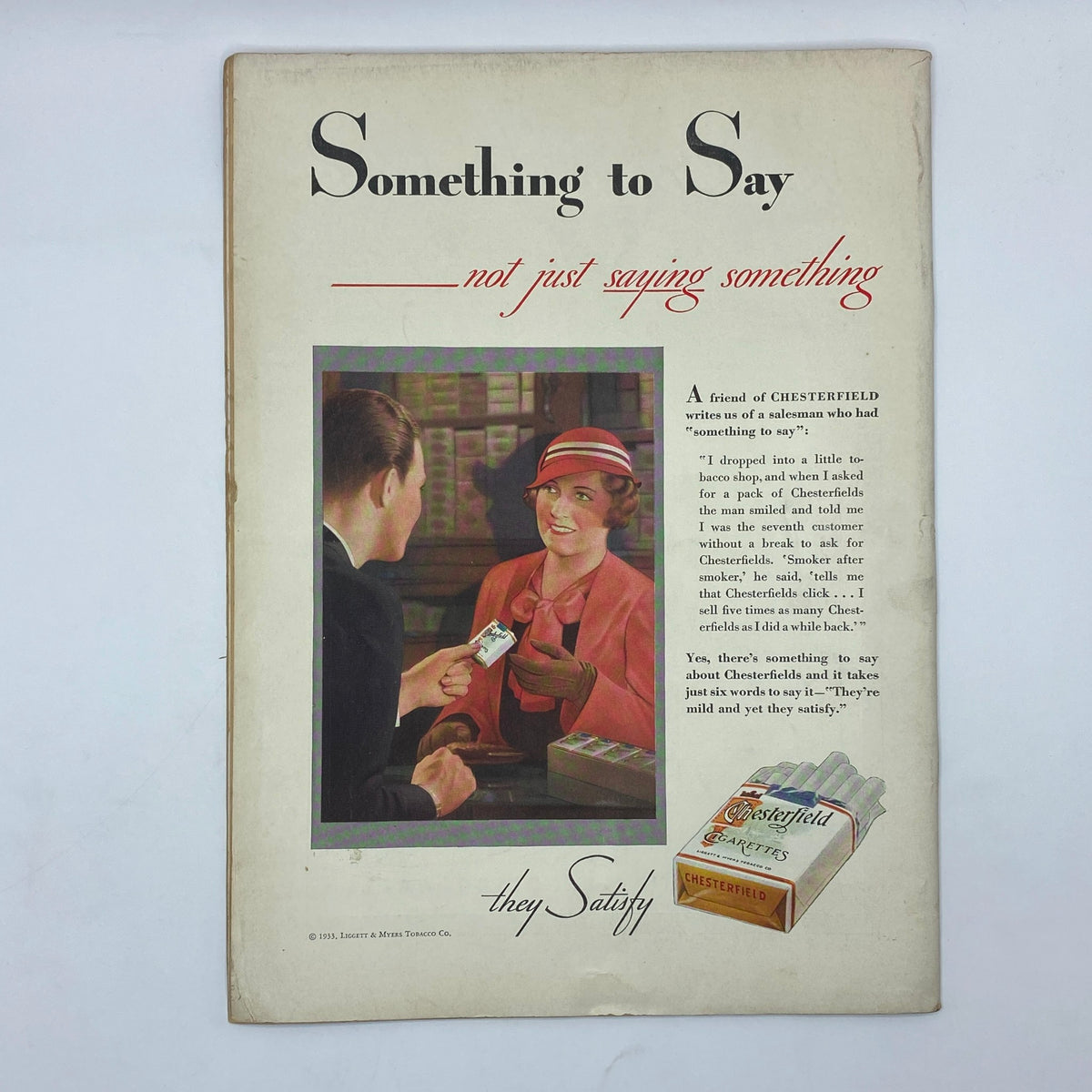 Chesterfield cigarette advertisement from The New Yorker magazine June 3, 1933, illustrated with a scene in a tobacco shop featuring a customer and salesperson discussing the product.