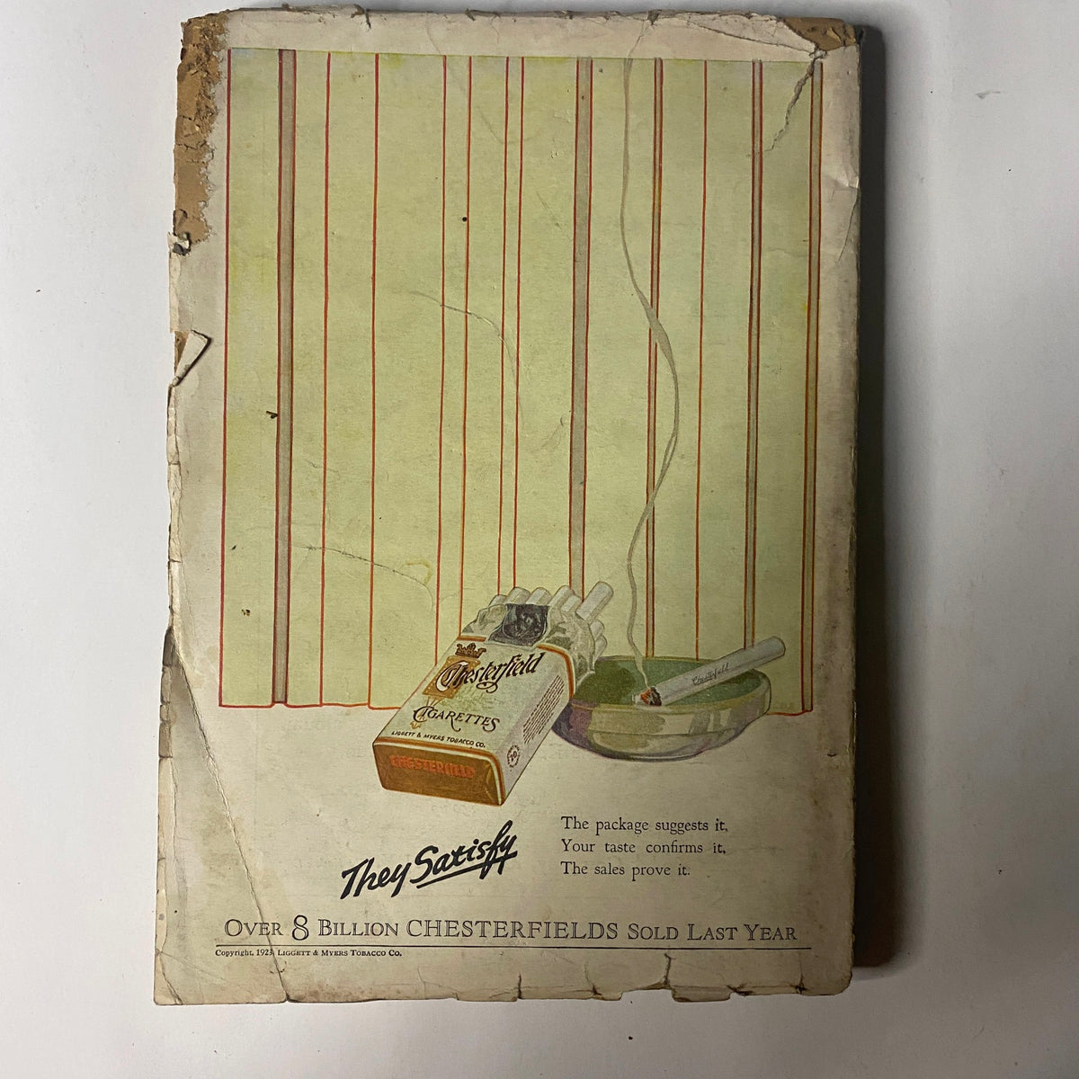 Back cover of People's Stories Magazine, March 1, 1923, displaying a vintage advertisement for Chesterfield cigarettes with some signs of wear.