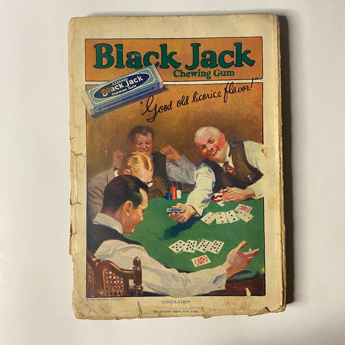 Back cover of Munsey's Magazine July 1923 featuring an advertisement for Black Jack Chewing Gum with an illustration of people playing cards.