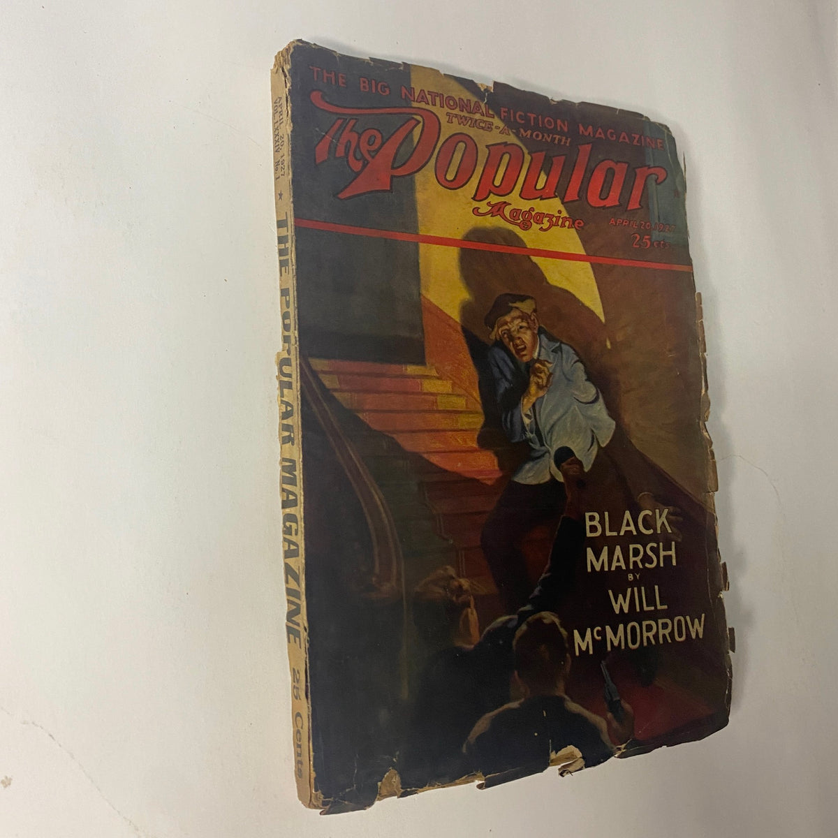 Cover image of The Popular Magazine from April 20, 1927, titled 'Black Marsh' by Will McMorrow, depicting a suspenseful moment with a character under threat.