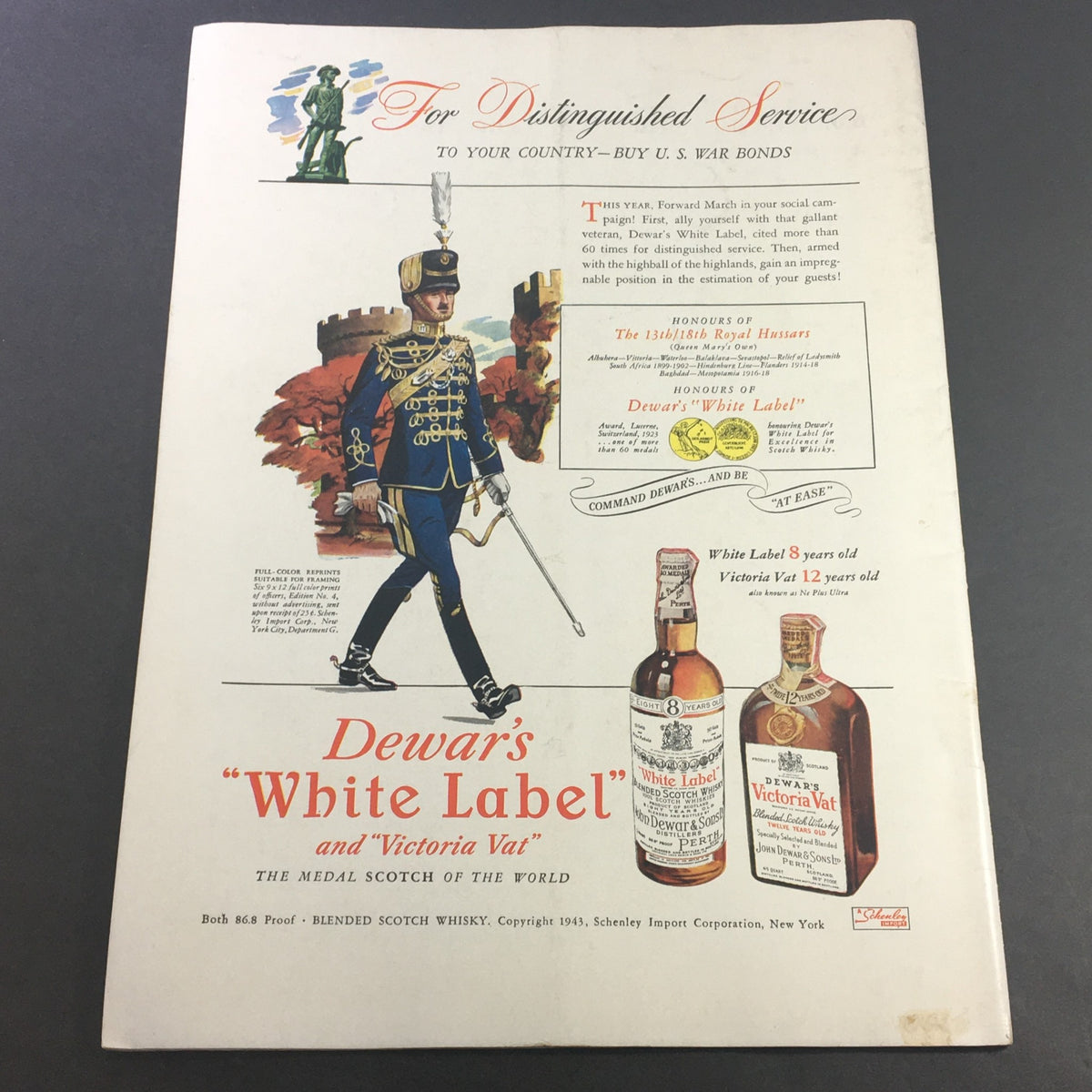 Back cover of VTG Gourmet The Magazine of Good Living March 1943 showcasing an advertisement for Dewar's whiskey, highlighting the distinguished service campaign during WWII.