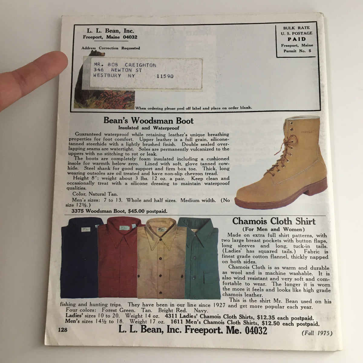 Back cover of the 1975 Fall L.L. Bean Retail Company, Inc. Price Guide Catalog featuring the 'Beans Woodsman Boot', 'Chamois Cloth Shirt', and pricing information, alongside an address label for authenticity.