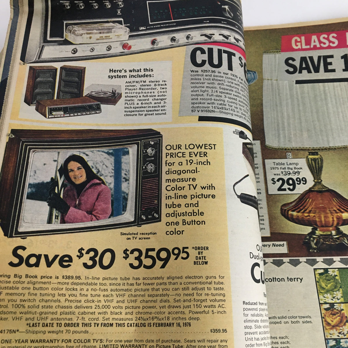 Interior page of the 1976 Sears Roebuck and Co. Midwinter Spectacular Catalog displaying a color television with pricing and savings information.