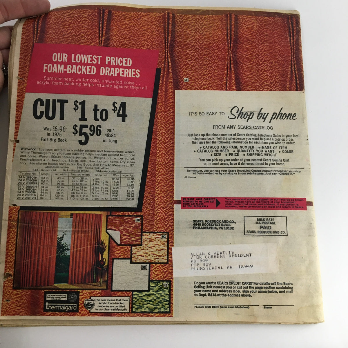 1976 Sears Roebuck and Co. Midwinter Spectacular Catalog back cover displaying a foam-backed drapery advertisement with prices and a phone shopping option.