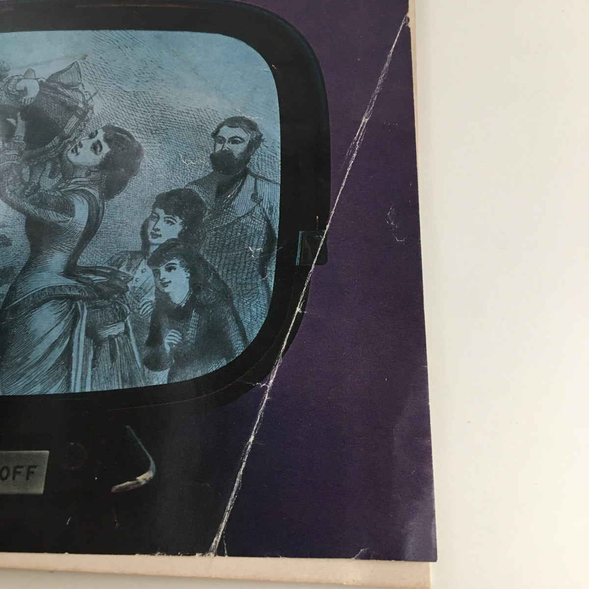 Close-up detail of the cover of Show Magazine December 1961 Vol. 1 No. 3, showcasing an artistic depiction of a woman and figures around a Christmas tree within a vintage television.