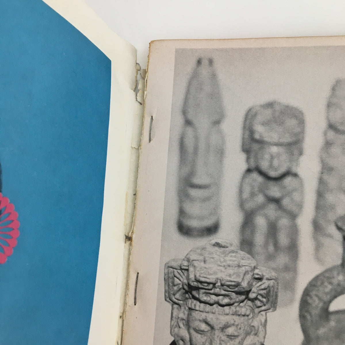 Inside page of Show Magazine December 1961 Vol. 1 No. 3 featuring images of artifacts or statues, showcasing the diverse content of this vintage publication.
