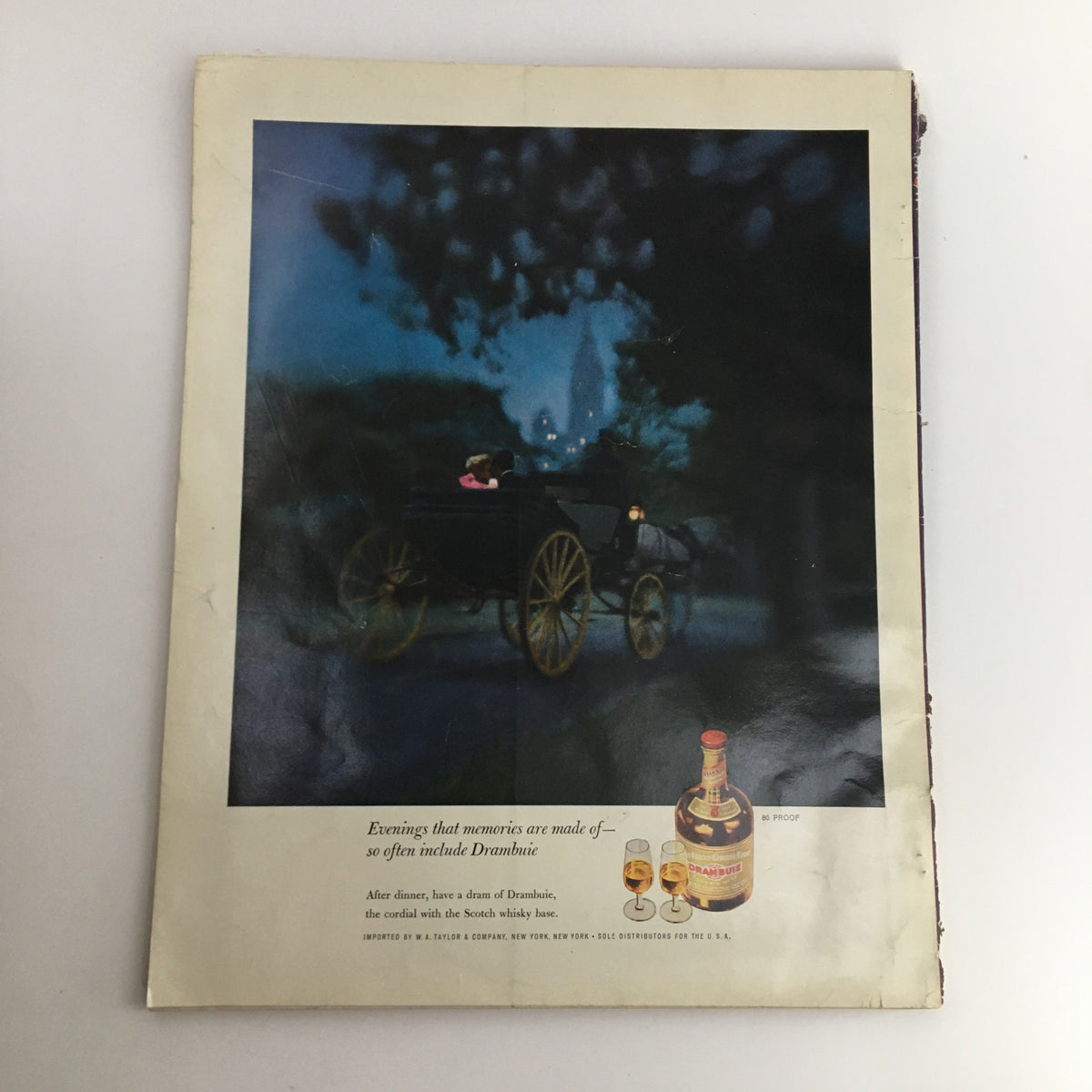 Show Magazine December 1961 Vol. 1 No. 3 back cover featuring an advertisement for Drambuie with a romantic carriage scene.