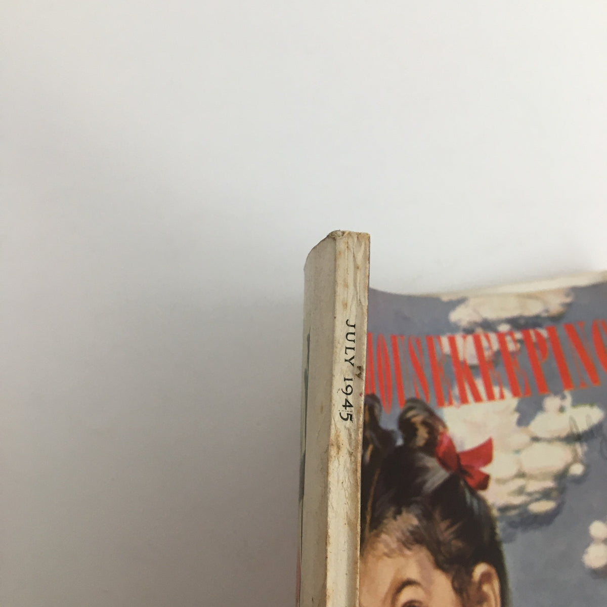 Side view of Good Housekeeping Magazine, July 1945 edition, featuring the title and date visible, showcasing its vintage aesthetic.