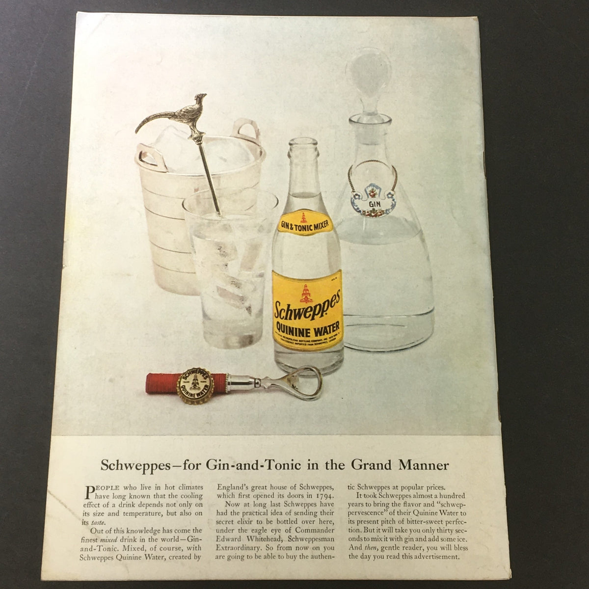 Page from VTG Gourmet The Magazine of Good Living July 1953 showing a Schweppes advertisement for gin and tonic, highlighting vintage drinkware and mixers.