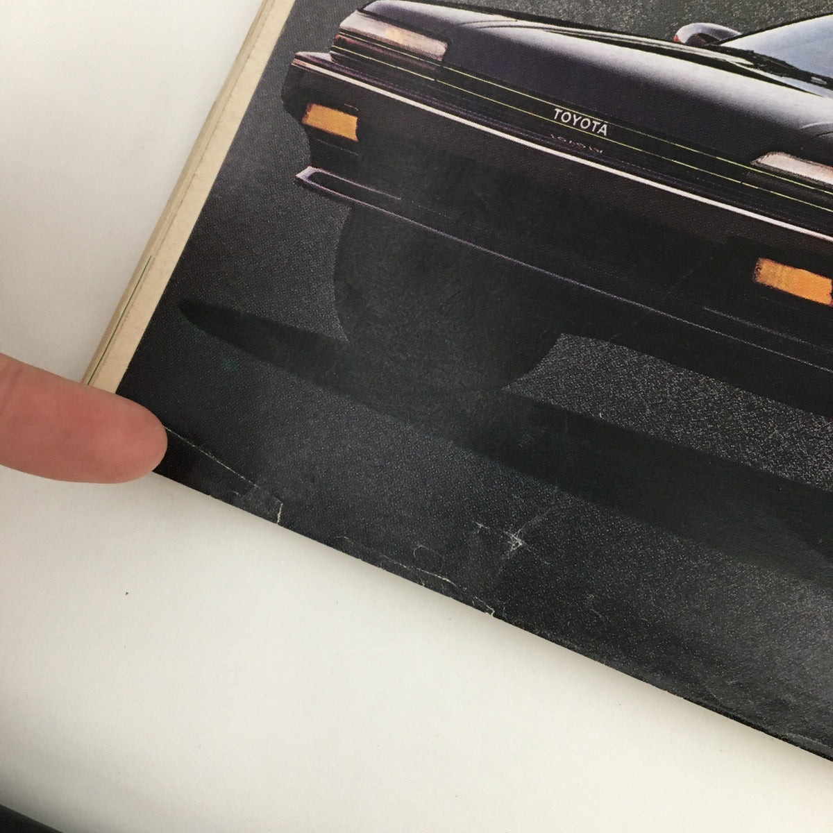 Close-up of the lower section of the back cover of Rolling Stone Magazine November 17, 1988, featuring details of the Toyota Corolla advertisement.