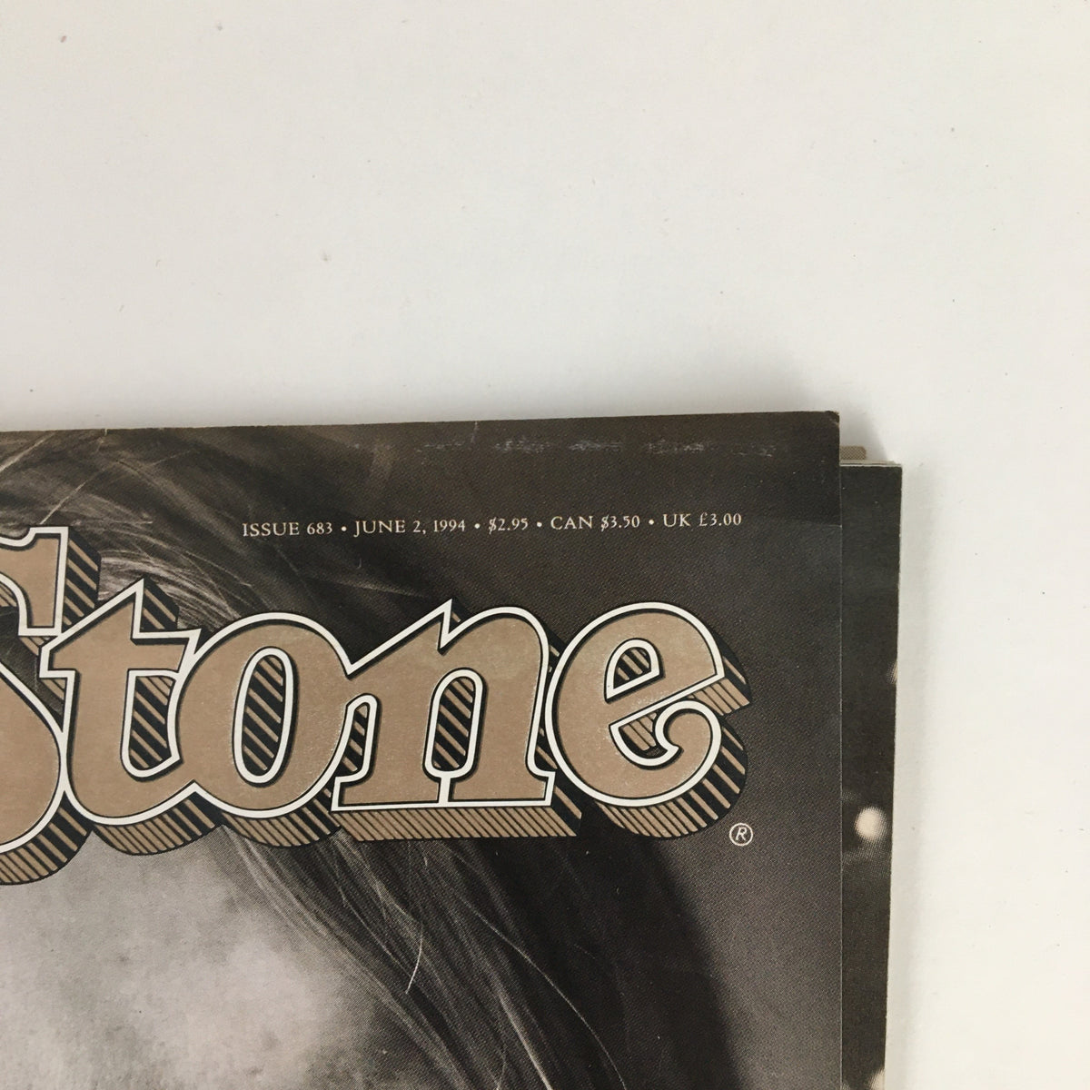 Close-up of the cover of Rolling Stone Magazine June 2, 1994, featuring the iconic title logo and issue details, including price and date.