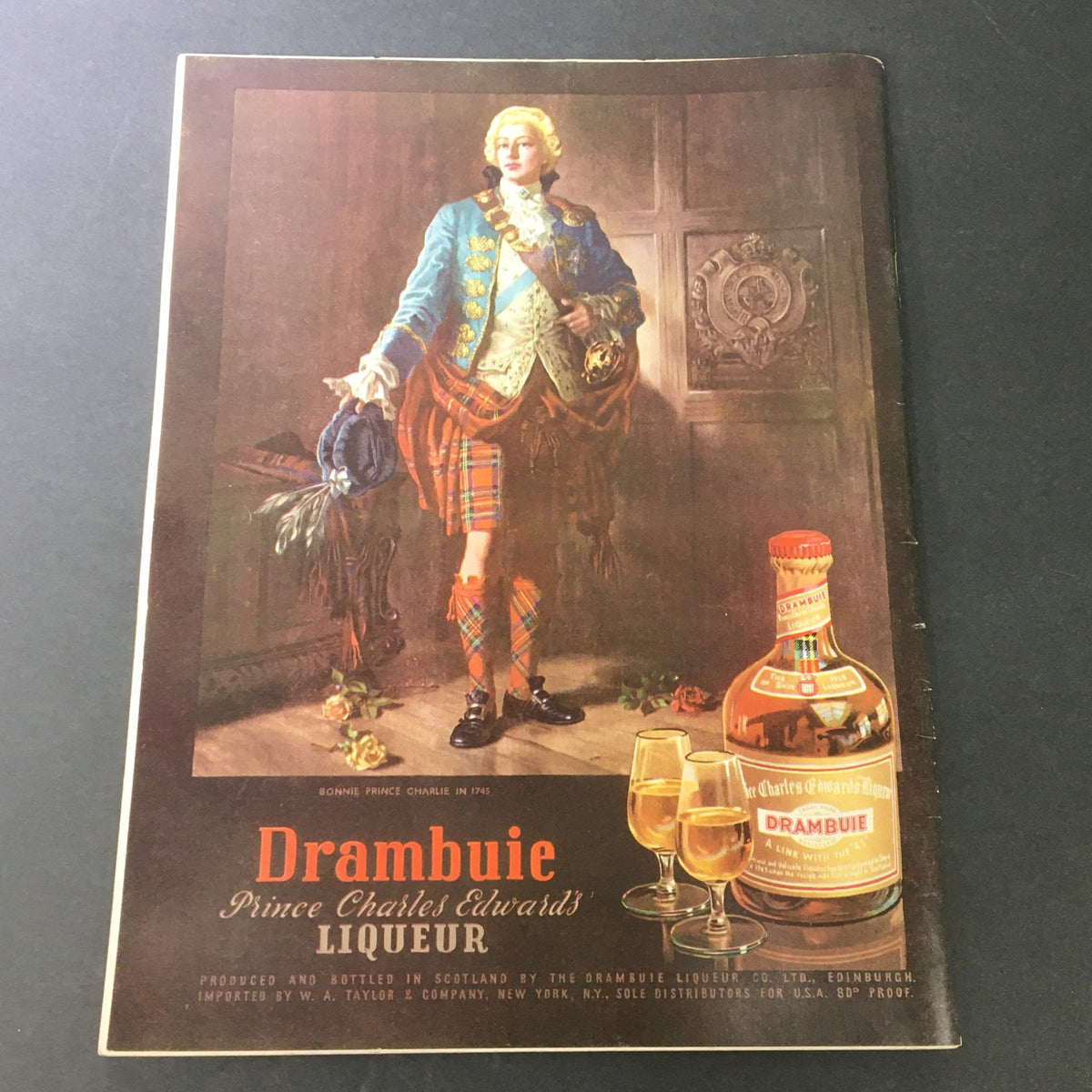 Advertisement for Drambuie liqueur featuring a historical figure in traditional attire, promoting the unique drink in the VTG Gourmet The Magazine of Good Living April 1955.