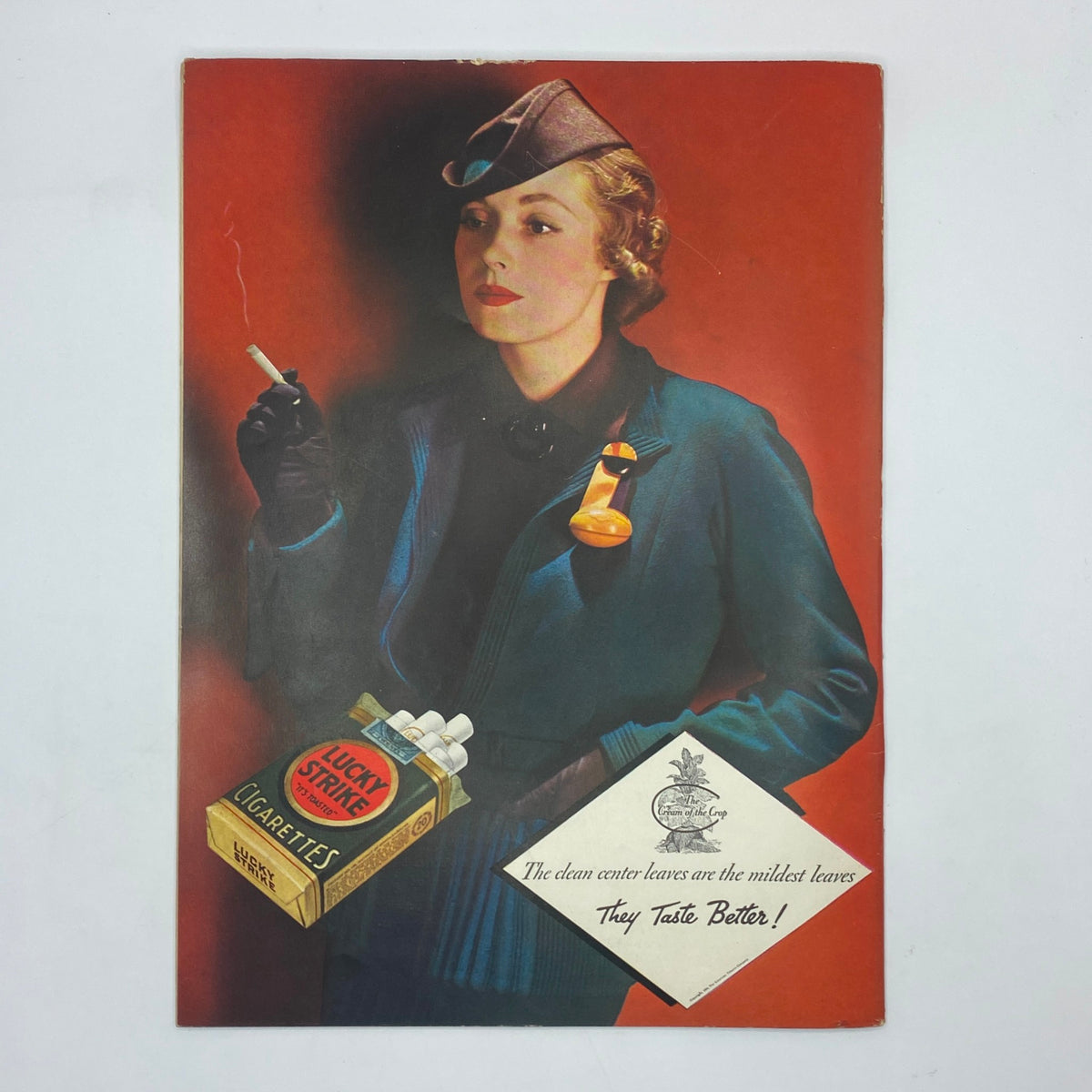 The New Yorker Complete Magazine October 27, 1934 featuring a captivating vintage image of a woman in a stylish outfit with a cigarette and Lucky Strike cigarette pack, embodying the elegance of the era and capturing the artistic essence of Constantin Alajalov's distinctive cover design.