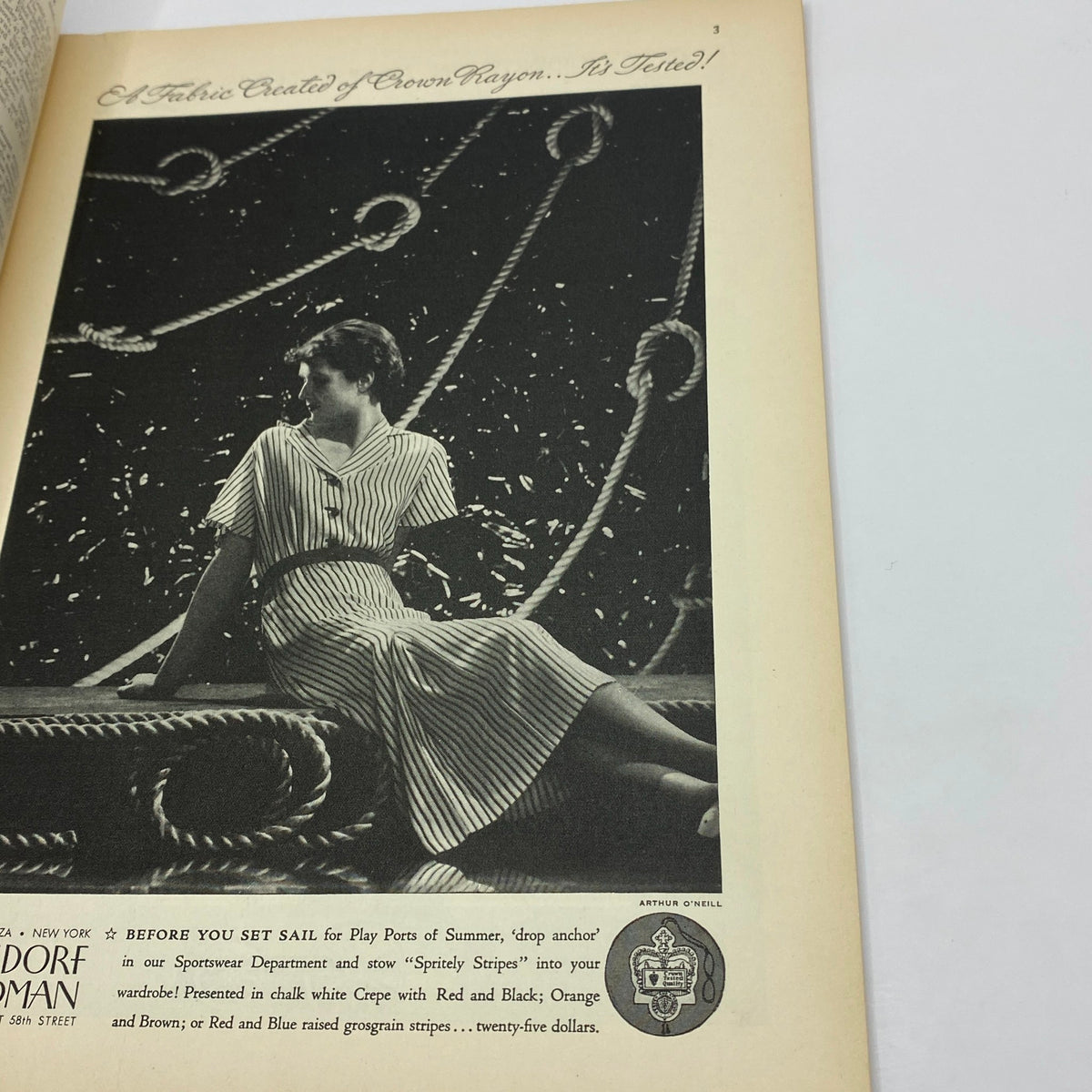 Advertising page from The New Yorker magazine April 28, 1934, depicting a woman in a striped dress, promoting summer fashion with a focus on fabrics, part of the issue with Ilonka Karasz's cover.