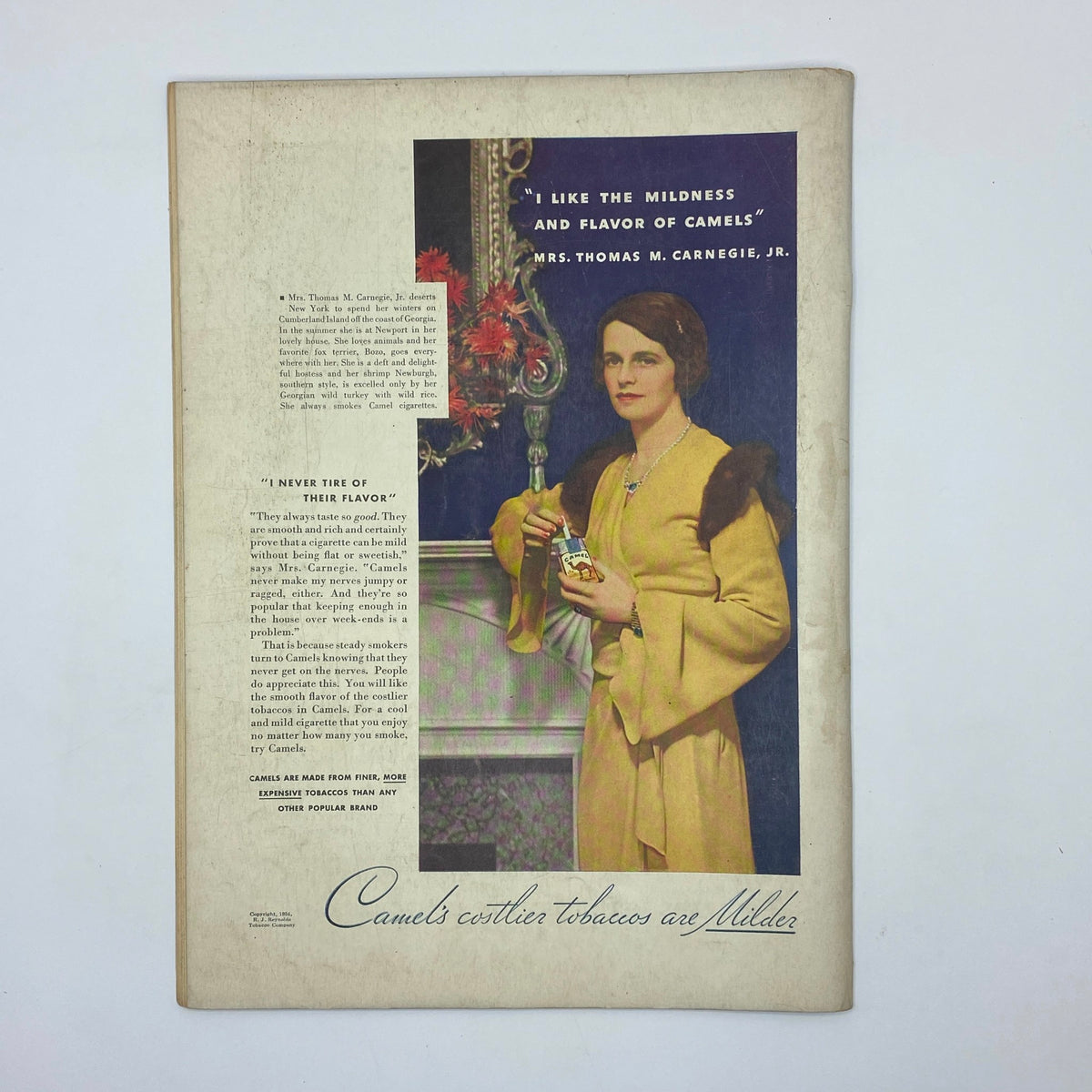Illustration from The New Yorker Complete Magazine December 30, 1933 showcasing a woman elegantly dressed, recommending Camel cigarettes with a quote about their mildness and flavor.