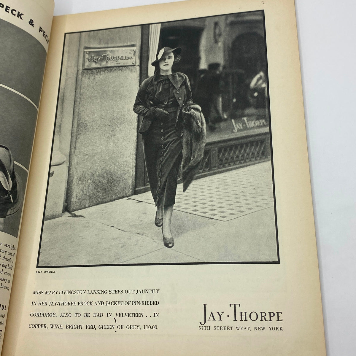 Interior fashion advertisement from The New Yorker Complete Magazine September 15, 1934, featuring a stylish woman in a Jay-Thorpe outfit, emphasizing 1930s fashion trends.