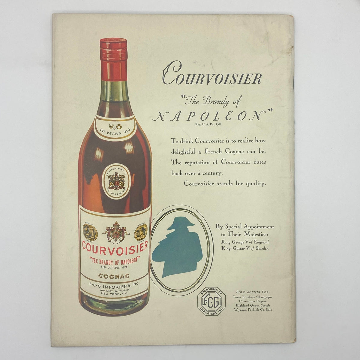 Vintage Courvoisier advertisement featuring a bottle of Cognac labeled as 'The Brandy of Napoleon', showcasing its 20 years old quality and historical significance. This ad exemplifies the elegance of French brandy culture.