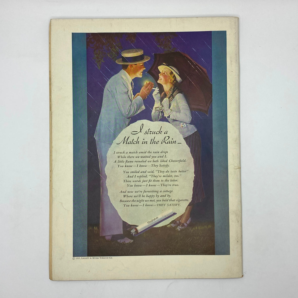 Back page of The New Yorker Complete Magazine June 1, 1935 featuring a vintage advertisement with a romantic theme, titled 'I struck a Match in the Rain'.