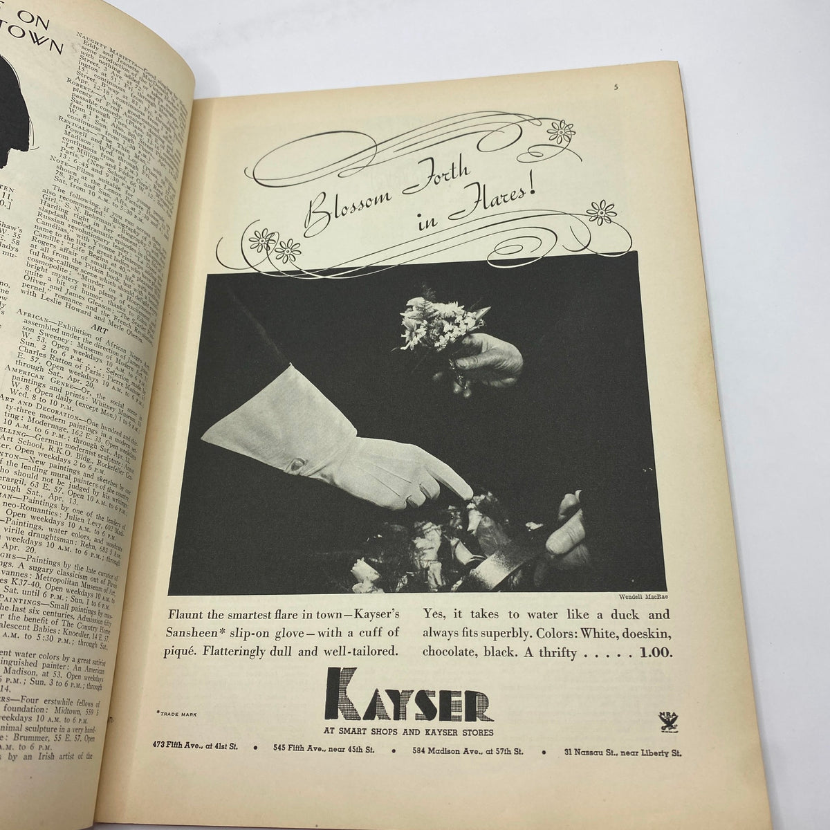 Advertisement page from The New Yorker Complete Magazine April 13, 1935 for Kayser gloves, featuring a stylish hand offering flowers, emphasizing elegance in fashion.
