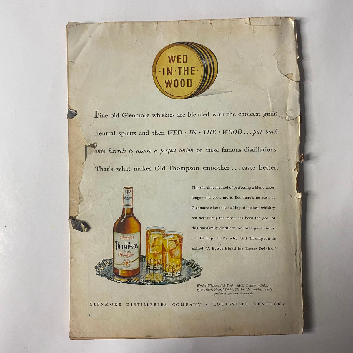 Back cover of Outdoor Life Magazine March 1947 displaying an advertisement for Wed In The Wood whiskies, featuring vintage graphics and text.