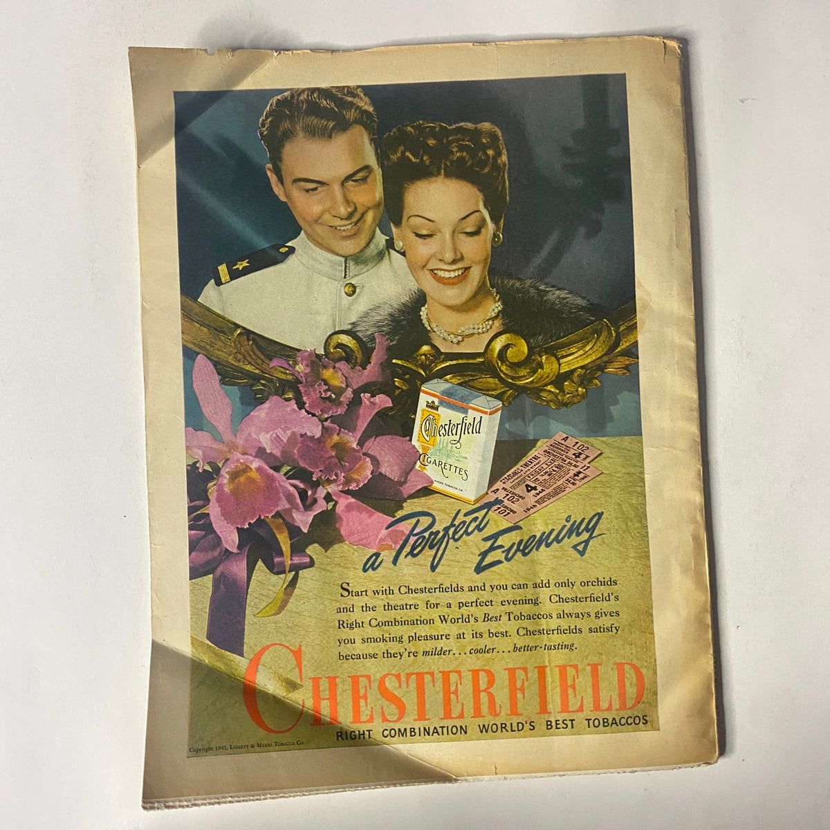 Vintage advertisement for Chesterfield Cigarettes from the September 1945 issue of Radio Romances Magazine, showcasing a couple and the tagline 'a Perfect Evening'.