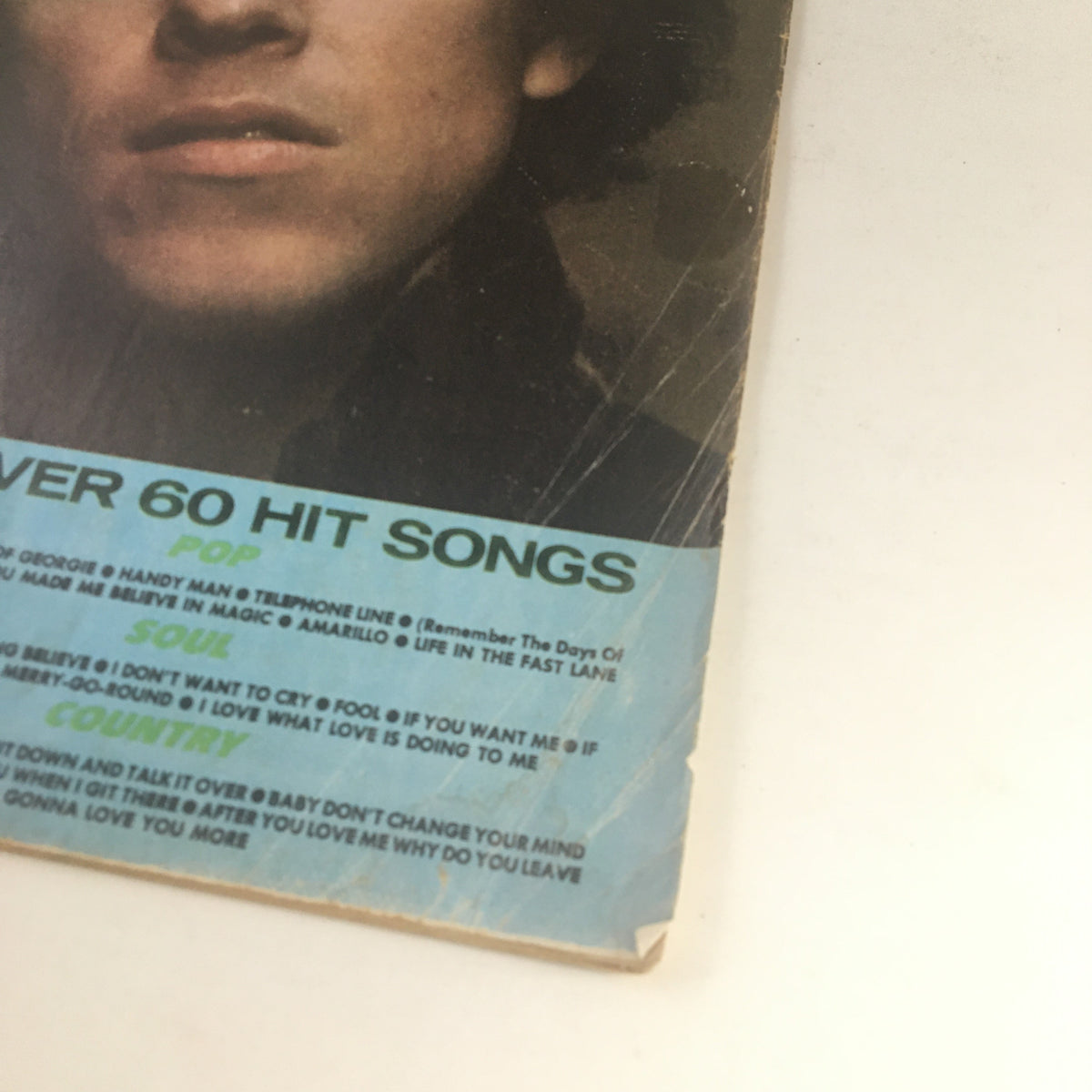 Close-up of the cover of Song Hits Magazine October 1977 highlighting the artists Leo Sayer, Tavares, and Hank Williams Jr., with song listings on the lower section.