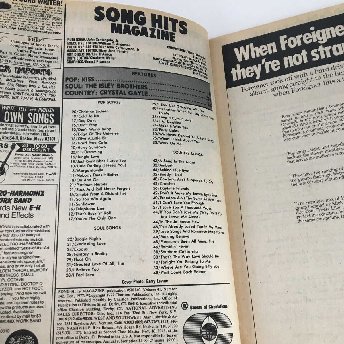 Inside view of Song Hits Magazine December 1977 showing a list of popular songs and features from artists like Kiss, The Isley Brothers, and Crystal Gayle. This page provides insights into the music landscape of the late 1970s.