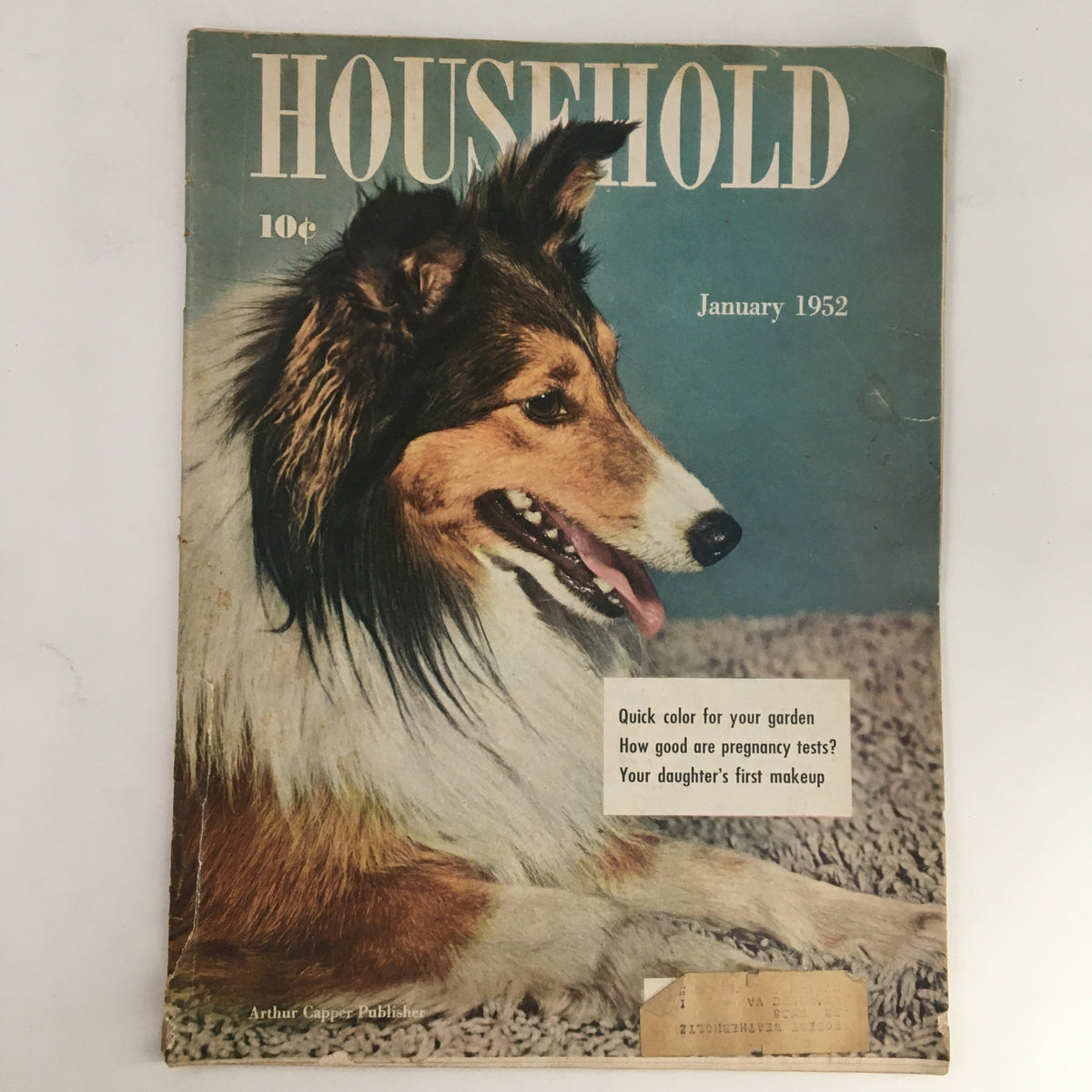 Cover image of Household Magazine January 1952, featuring a dog and text including topics on gardening and pregnancy testing.