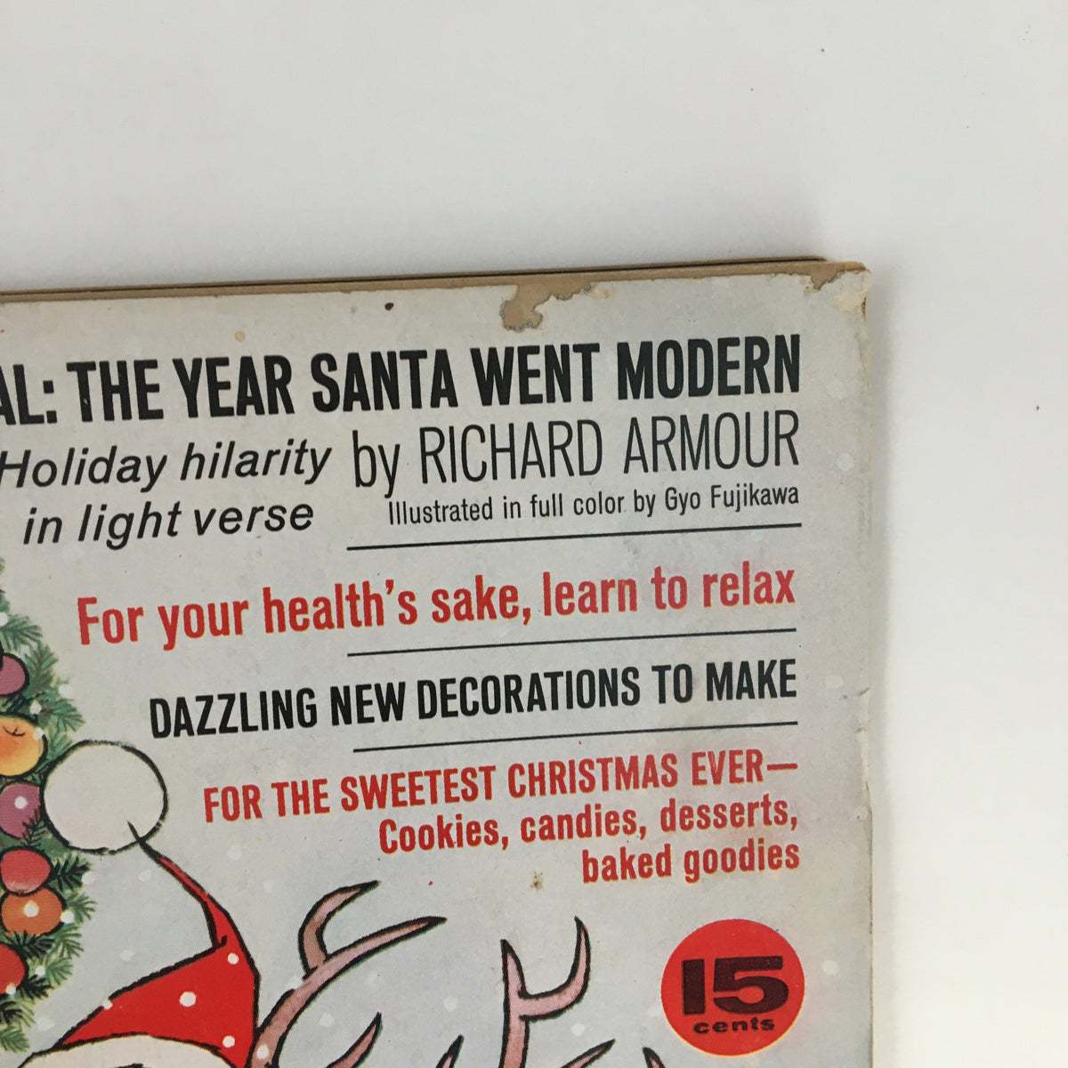 Detailed view of the Family Circle Magazine December 1963 cover including a festive wreath and text promoting holiday content. The title 'The Year Santa Went Modern' is visible.