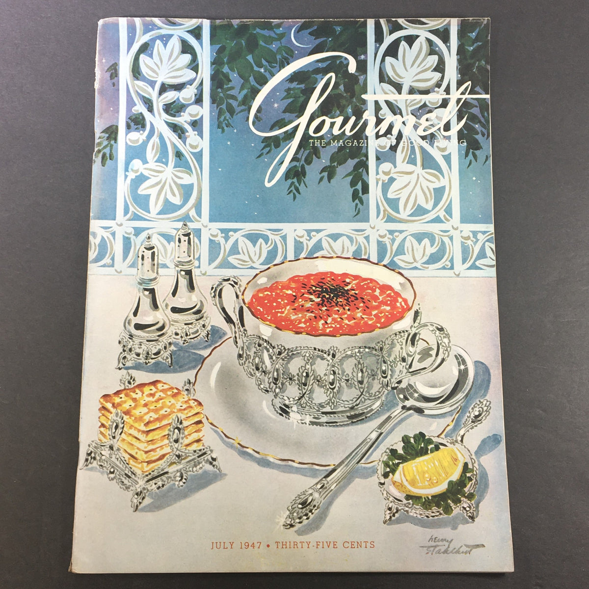 Cover image of VTG Gourmet The Magazine of Good Living July 1947 featuring an elegant table setting with soup, crackers, and decorative salt shakers.