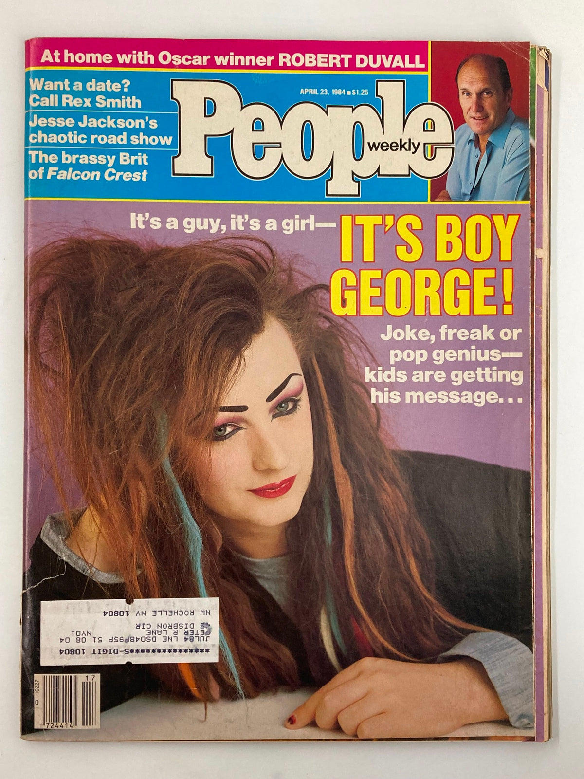 Cover of People Weekly Magazine dated April 23, 1984 featuring Boy George with vibrant hair and makeup, and Robert Duvall. The title reads 'It’s Boy George!' and highlights his presence in 1980s pop culture.