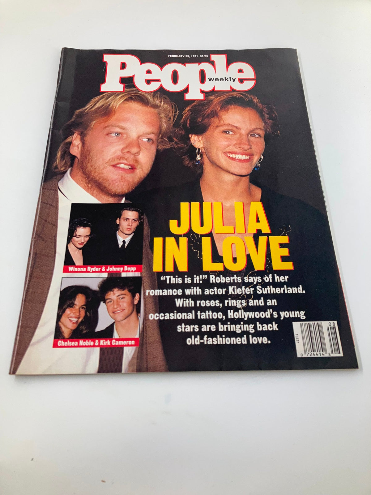 Front cover of People Weekly Magazine dated February 25, 1991, showcasing Julia Roberts and Keith S., highlighting the article 'Julia in Love' with additional images of celebrities Winona Ryder and Johnny Depp.