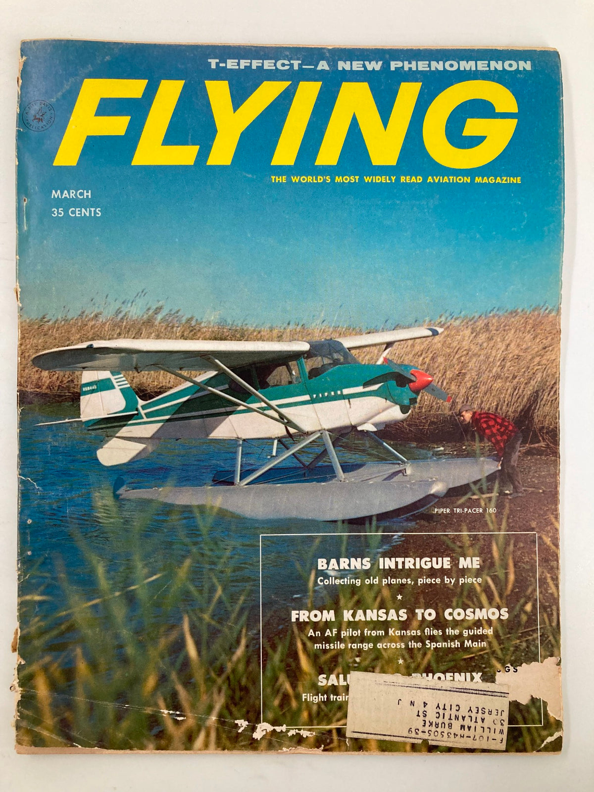 Cover of VTG Flying Magazine March 1958 featuring the 1958 Tri-Pacer 160 on Edo Floats, showcasing vibrant colors and a serene lake background.