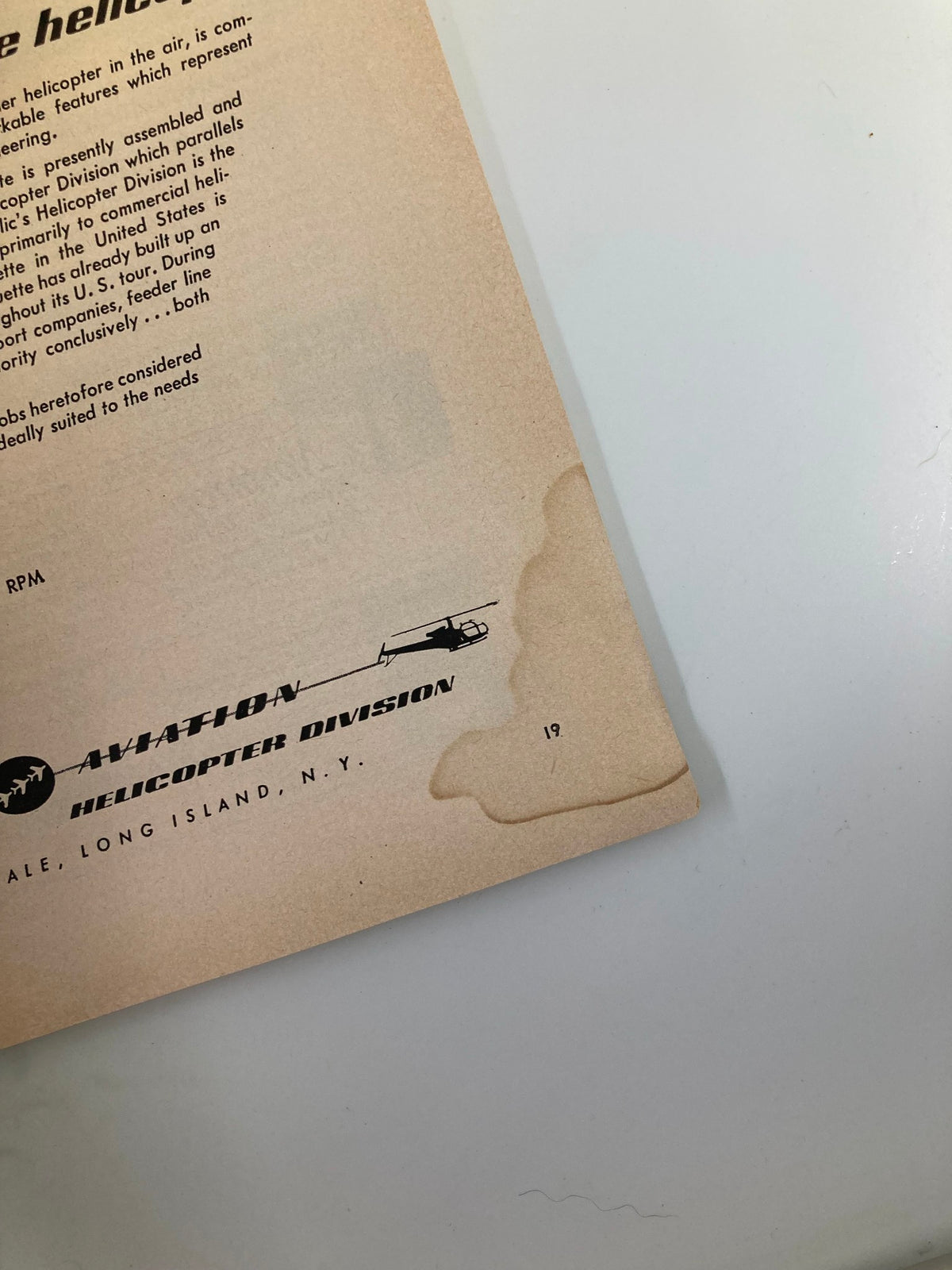 Page from VTG Flying Magazine April 1958 featuring an advertisement for helicopters, showcasing the publication's focus on aviation.