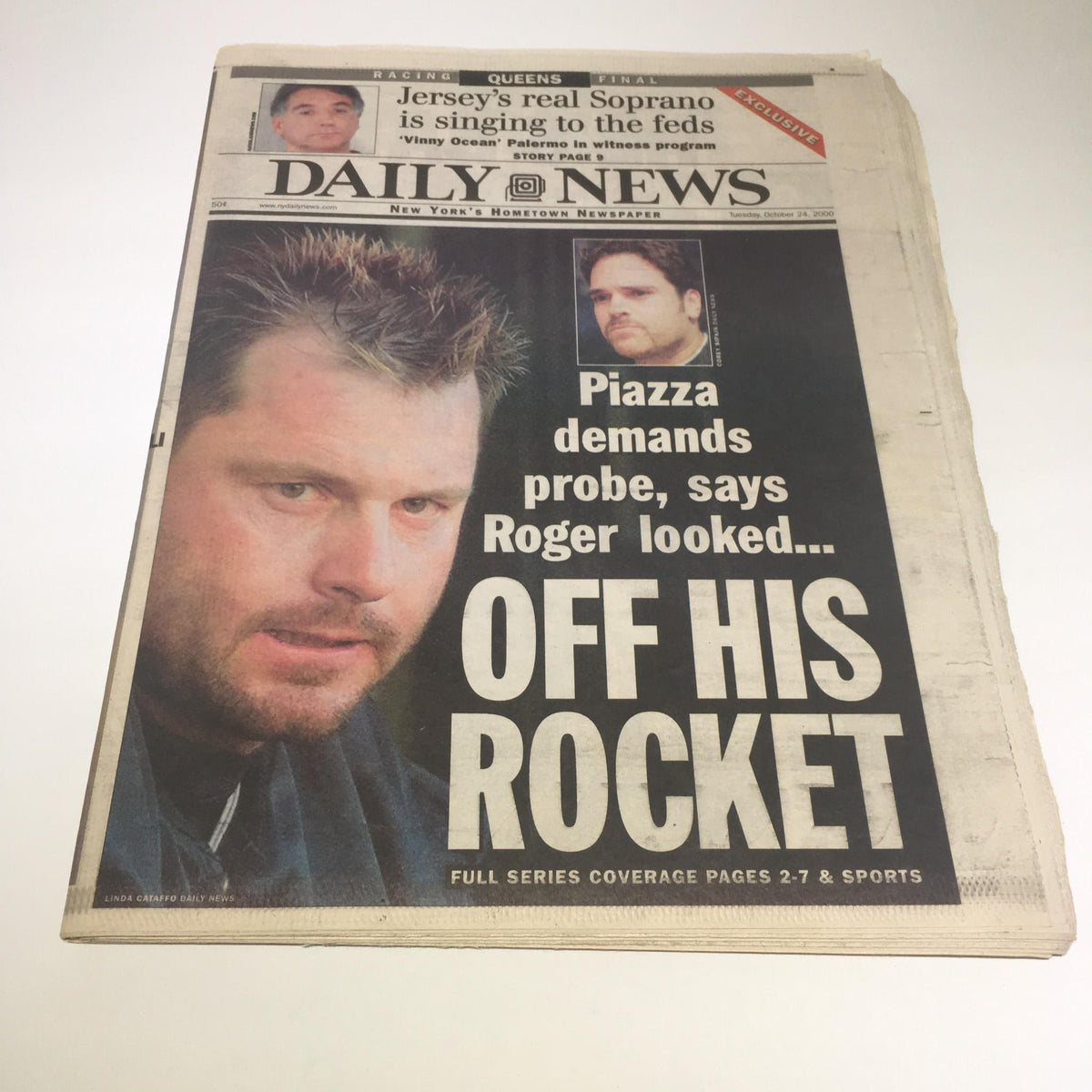 New York Daily News front page from October 24, 2000, featuring the headline: 'Piazza demands probe, says Roger looked... off his rocket', showcasing an image of Mike Piazza.
