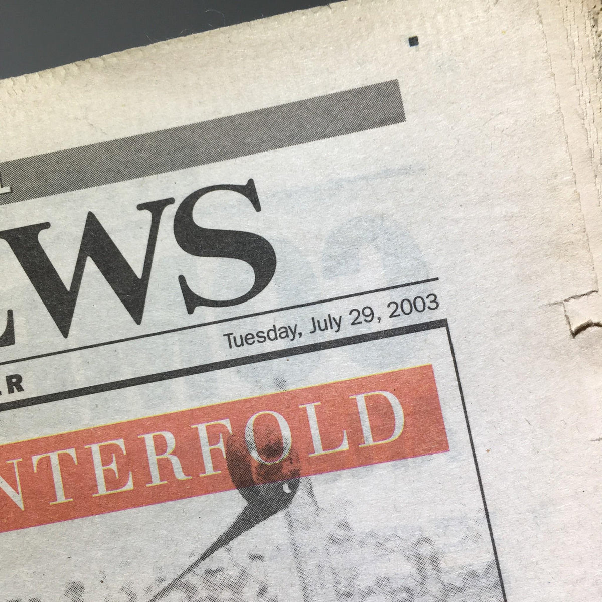 Close-up of the NY Daily News date on July 29, 2003, displaying the publication details and the mention of a special centerfold edition.