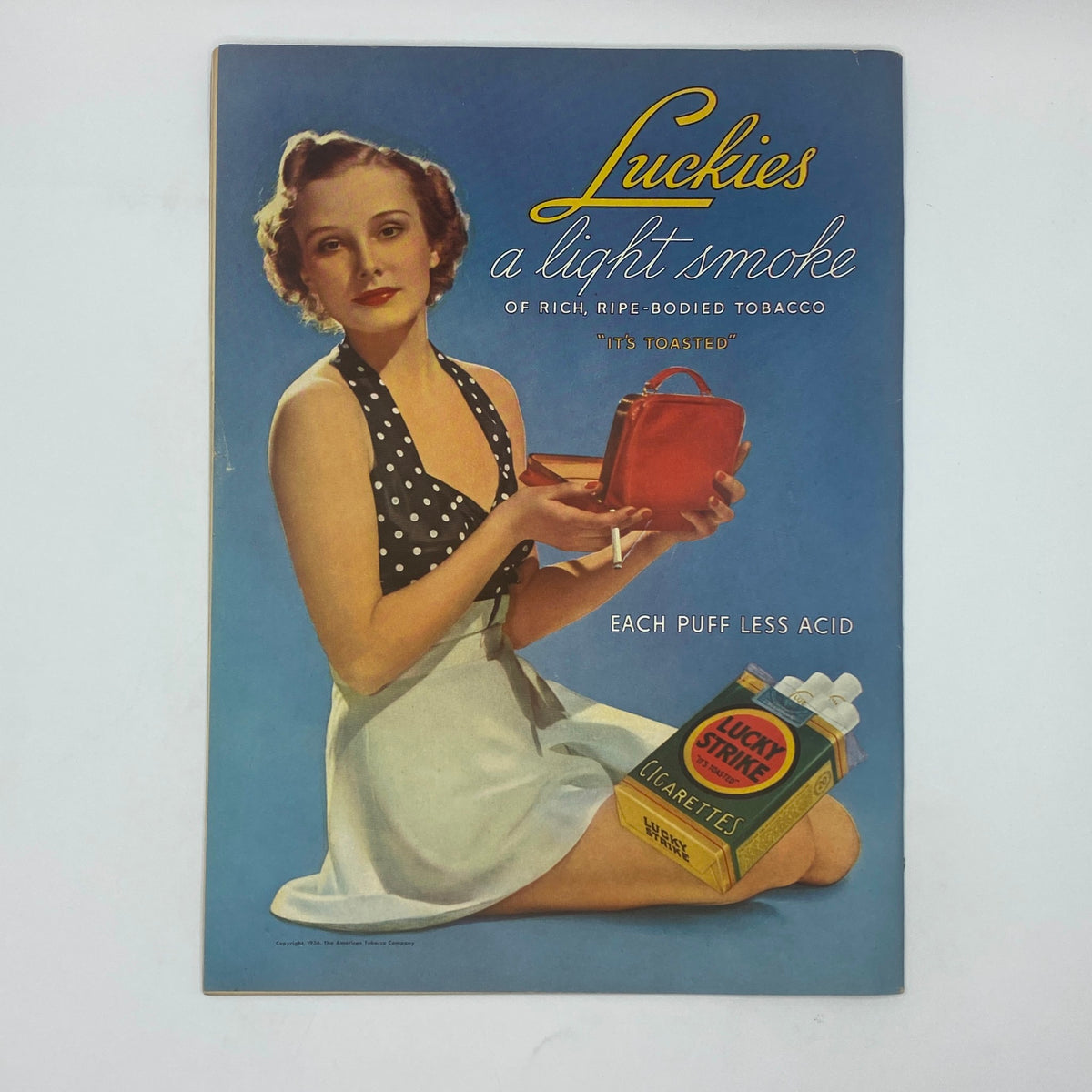 Cover of The New Yorker magazine from July 25, 1936 featuring artwork by William Galbraith, showcasing a woman dressed in a polka-dot bathing suit holding a red purse and a cigarette, embodying the elegant fashion of the era.