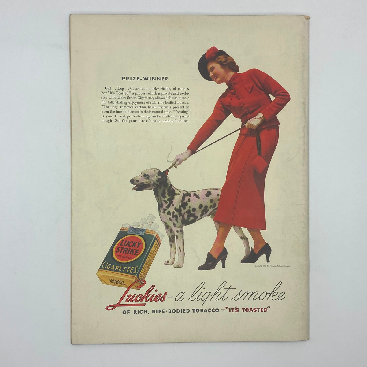 Advertisement from The New Yorker Complete Magazine November 21, 1936 featuring Lucky Strike cigarettes, depicting a woman in red and her Dalmatian dog.