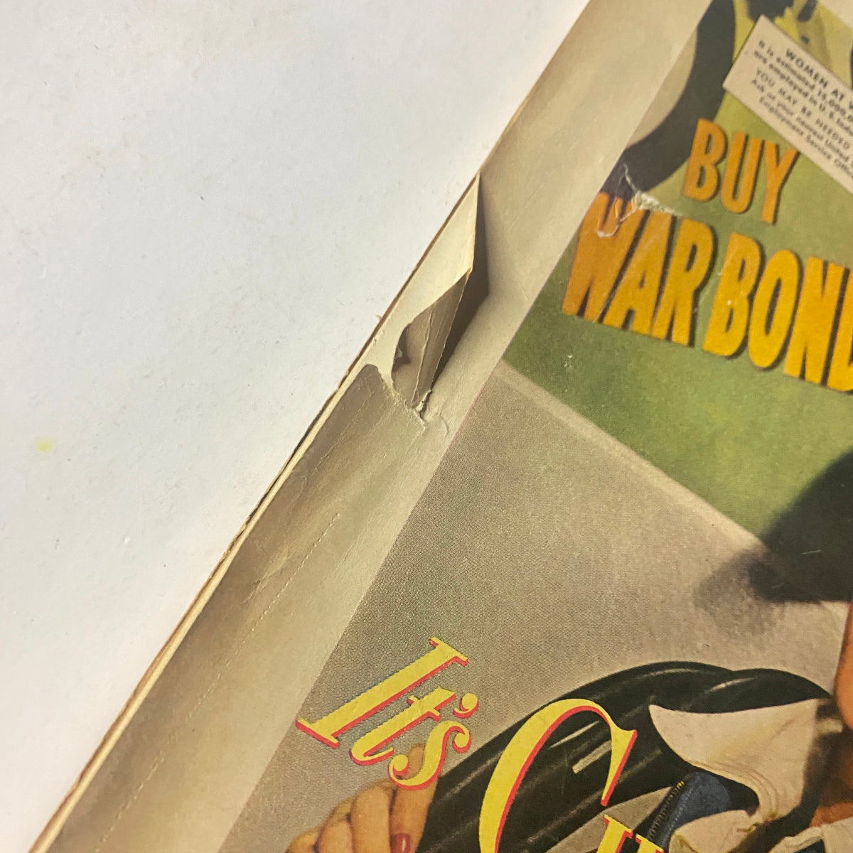 Detail of the vintage Chesterfield advertisement in Radio Mirror Magazine March 1943 showing a woman with a cigarette.