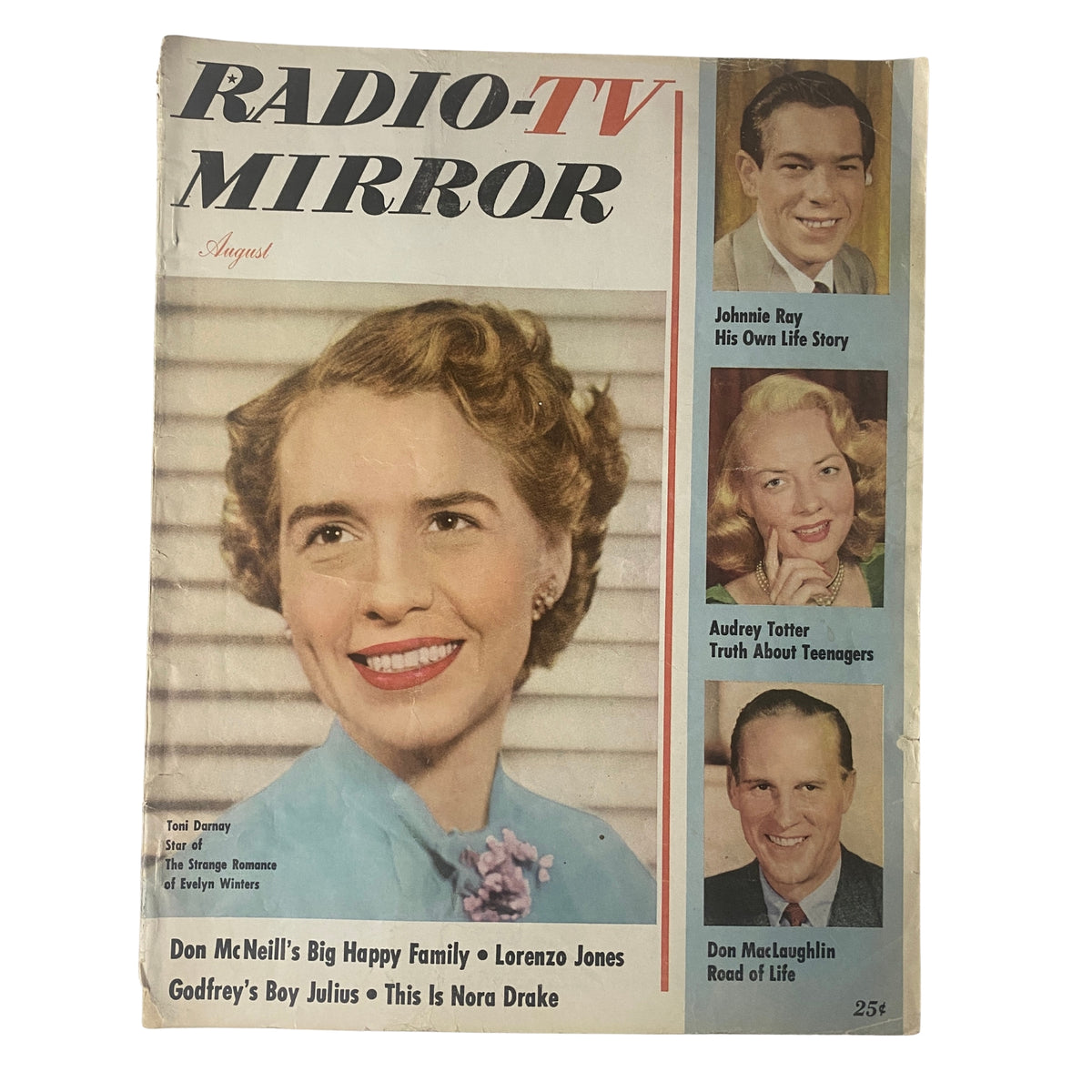 Cover of Radio-TV Mirror Magazine August 1952 featuring Toni Darnay, Johnnie Ray, Audrey Totter, and Don McLaughlin with headlines and a vintage aesthetic.