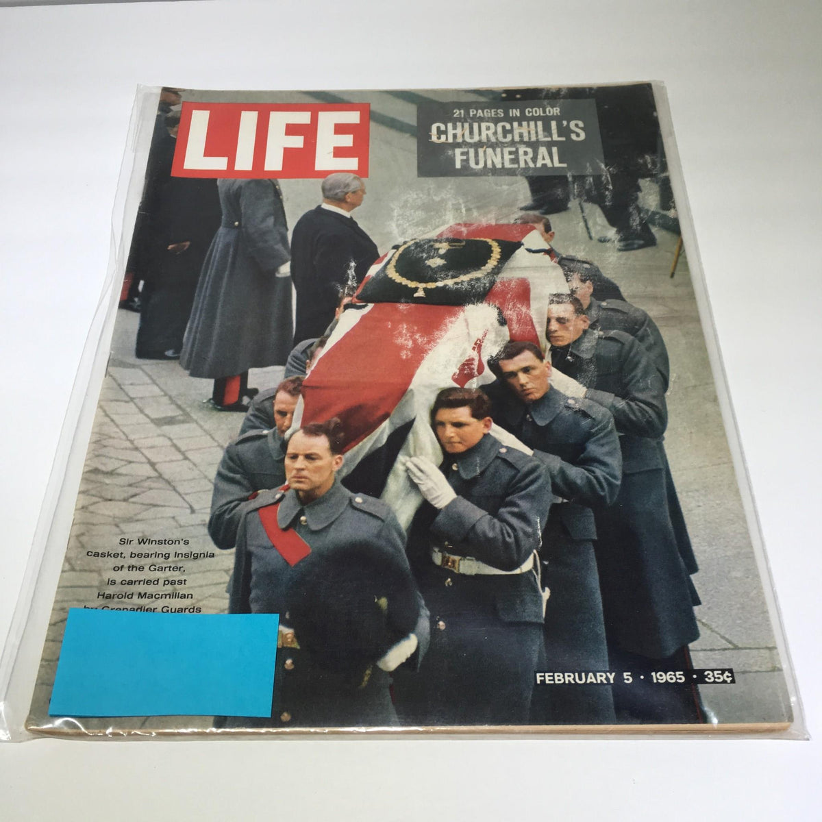 Cover of Life Magazine from February 5, 1965, featuring Winston Churchill's Funeral. The cover shows soldiers carrying the casket draped in the Union Jack, with captions highlighting the event's significance.